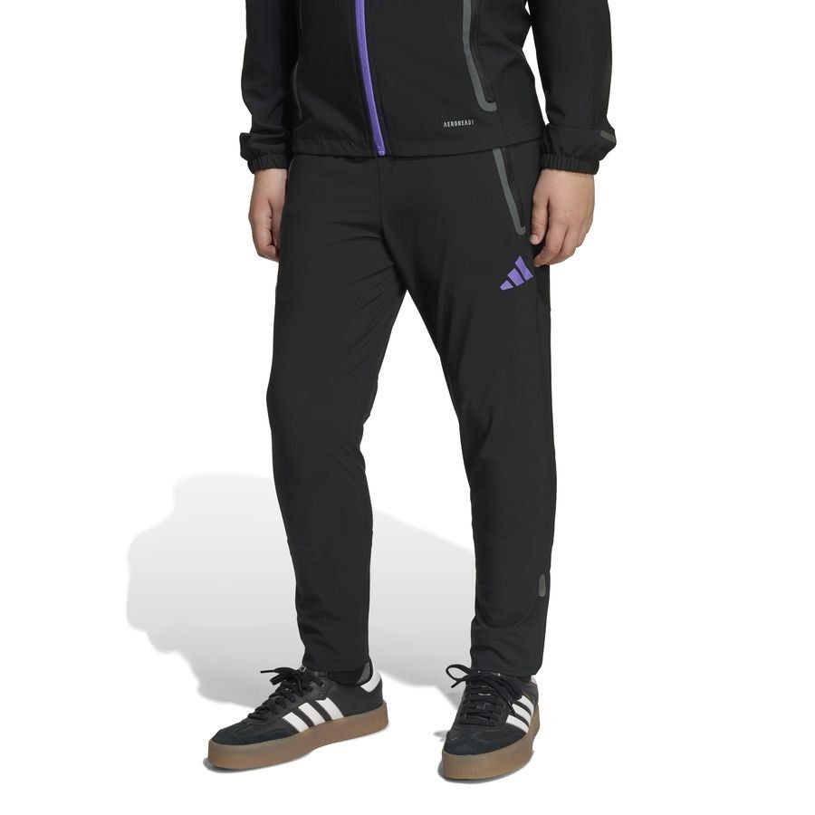 Manchester United Training Trousers Tiro 25 Competition Vis Tech Travel - Black/Purple Rush Kids-SoccerKits Hub | Buy Soccer Jerseys Online